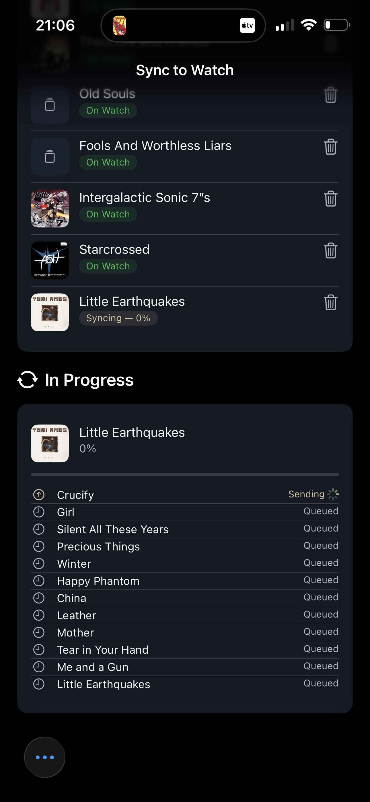 iPhone Watch sync screen showing an upload in progress