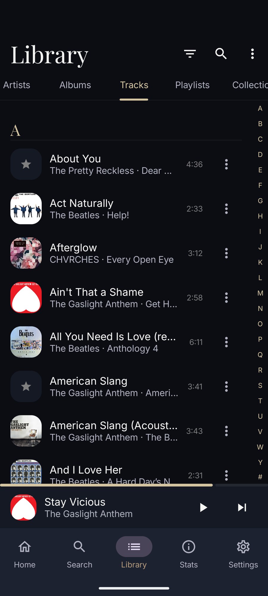 The Android track list, sorted alphabetically with section letters, artwork thumbnails, artist and album, durations and an A to Z index.