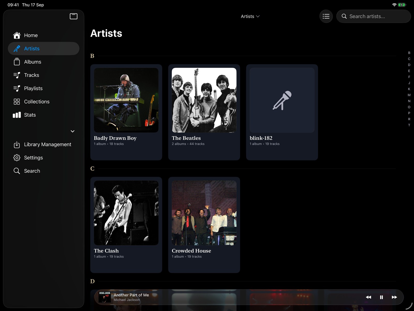 The iPad artist grid in landscape with artist photographs.