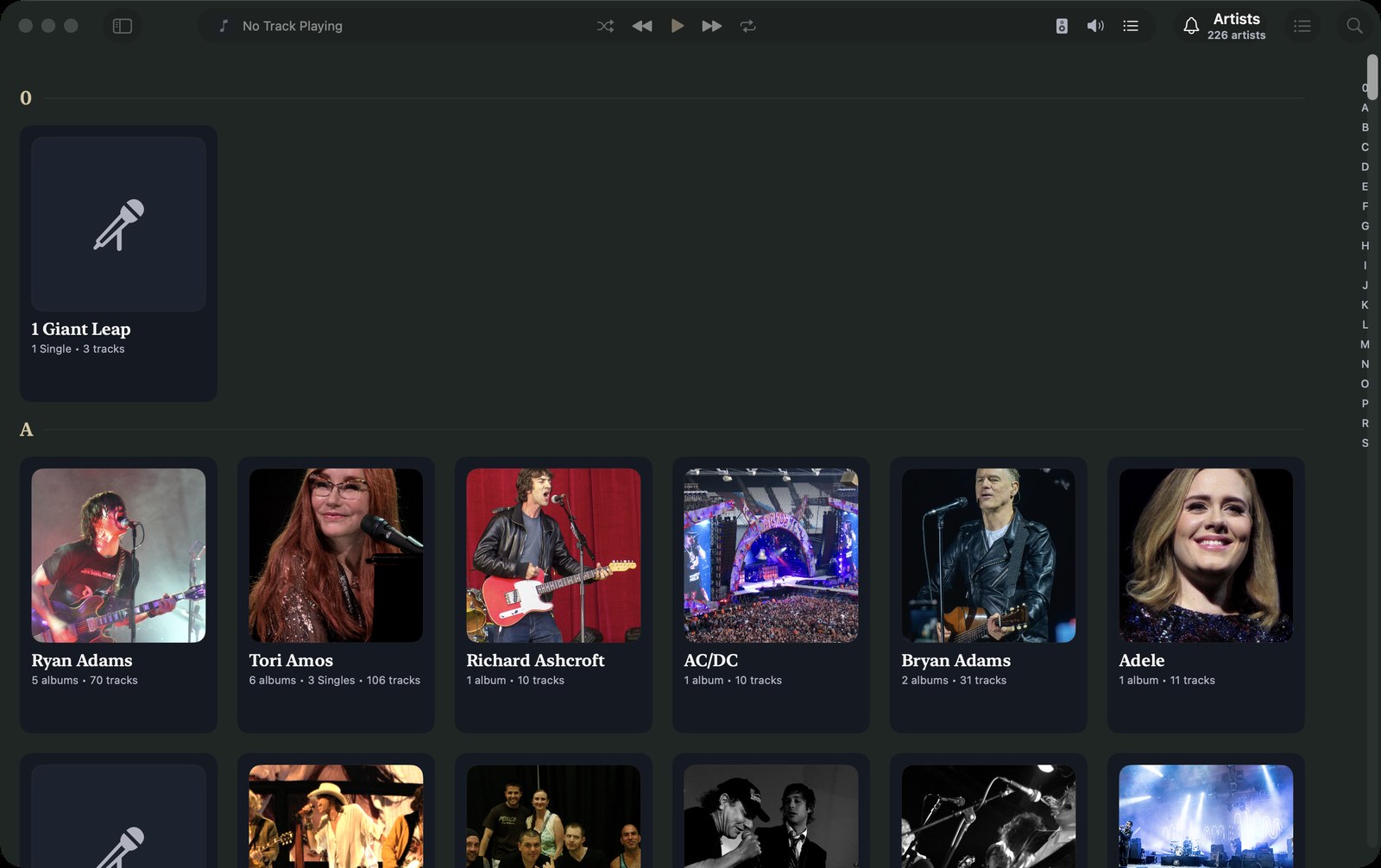 The Mac artist grid with artist photographs, album and track counts, and an A–Z index.
