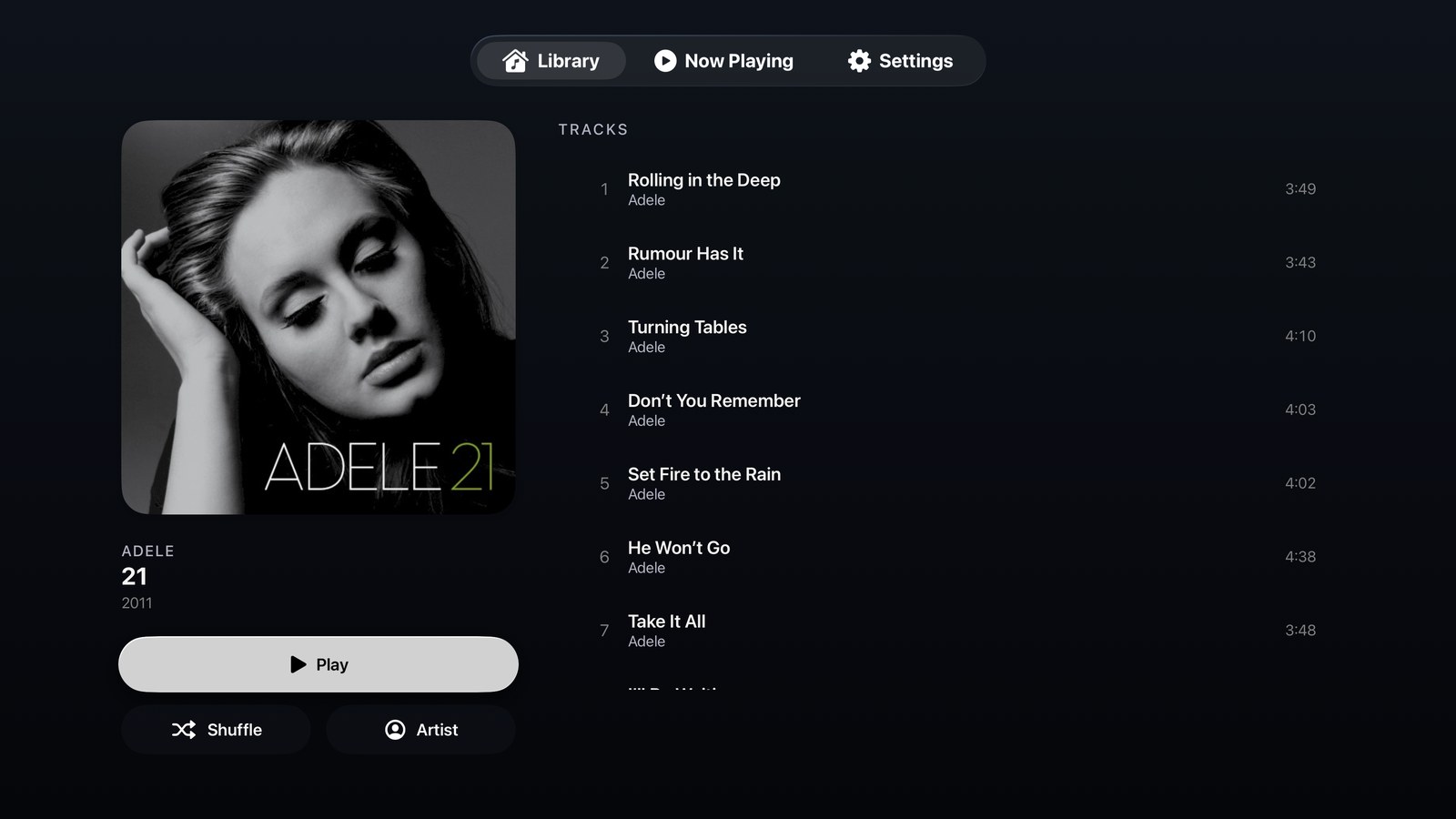 An album on Apple TV: artwork with Play, Shuffle and Artist buttons beside the track list.